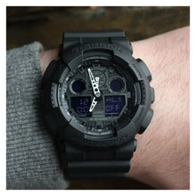 Cargar imagen en el visor de la galería, RELOJ DEPORTIVO PARA UNISEXO G-SHOCK GA_100 GA-100-1A1HDR - NEGRO
